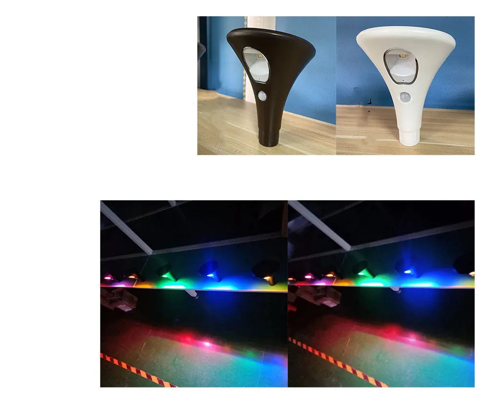 Solar-powered garden ground light with metal spike, LED lamp, and adjustable pole on grass.