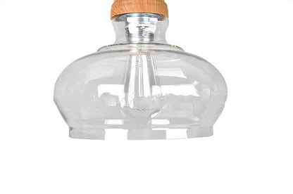 Glass single head pendant light with wood grain finish and adjustable cord.