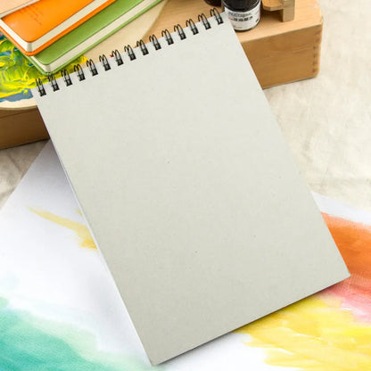 Green spiral-bound water-soluble colour lead sketchbook in 8K and 16K sizes.