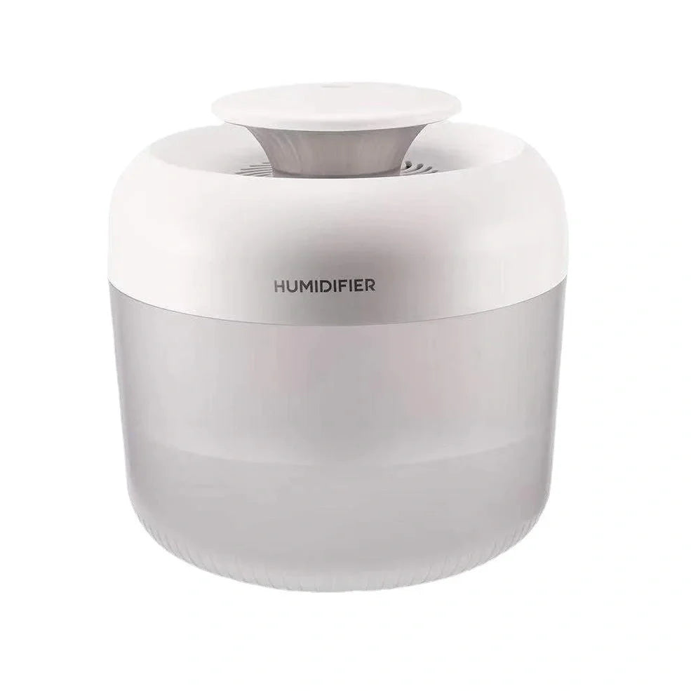 Round white ultrasonic humidifier with LED lights and water mist emitting from top
