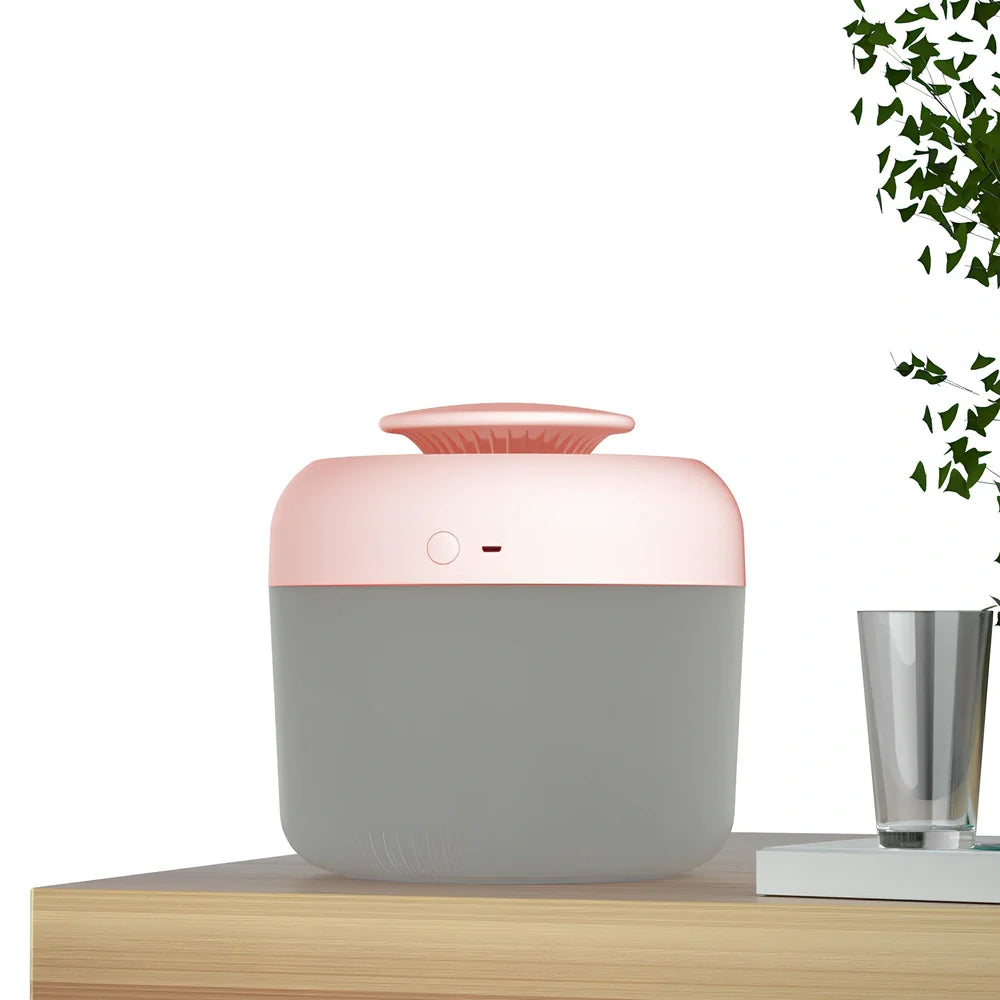 Round white ultrasonic humidifier with LED lights and water mist emitting from top
