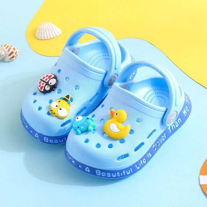 Kids cartoon slippers in yellow, blue, and pink with fun designs for summer wear