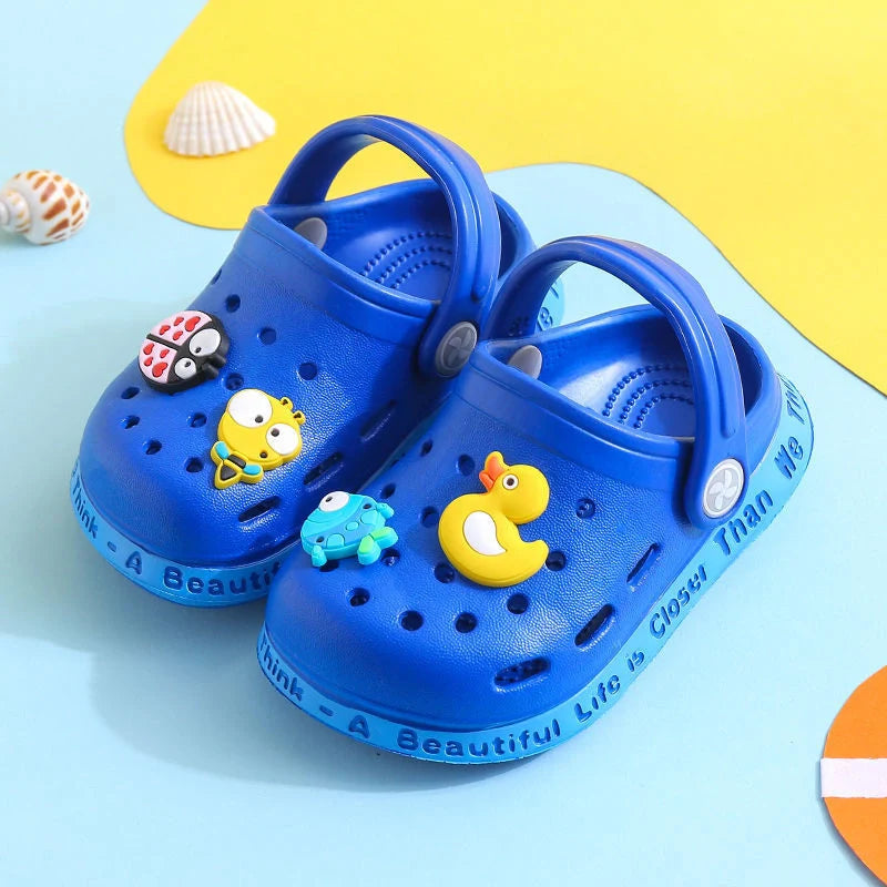 Kids cartoon slippers in yellow, blue, and pink with fun designs for summer wear