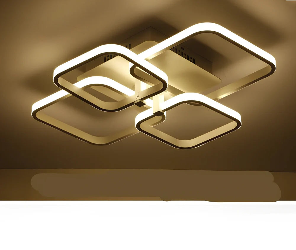 White modern square LED ceiling lamp with 4 light heads and rectangular shade measuring 580×460mm