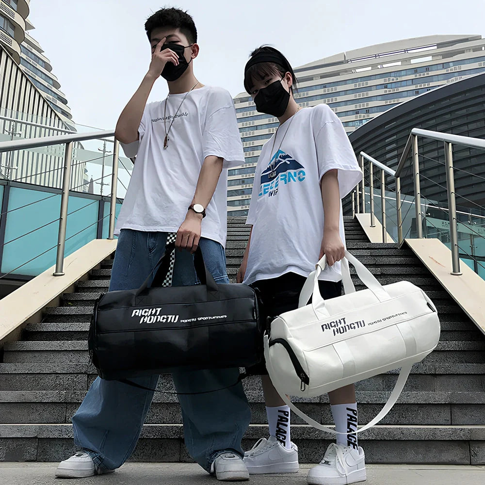 Cylindrical waterproof sports travel bag with multiple internal compartments and PU leather exterior