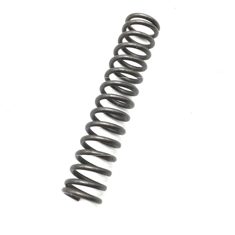 Metal pneumatic belt machine accessory kit with 330mm and 520mm rollers, blades, springs, and couplings on a workbench.