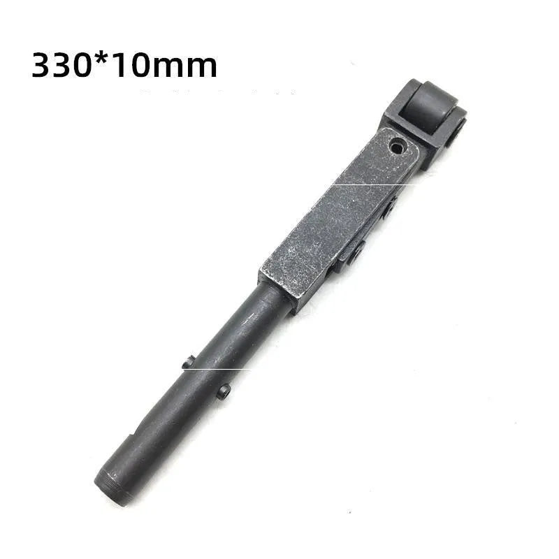 Metal pneumatic belt machine accessory kit with 330mm and 520mm rollers, blades, springs, and couplings on a workbench.