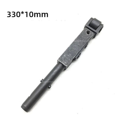 Metal pneumatic belt machine accessory kit with 330mm and 520mm rollers, blades, springs, and couplings on a workbench.