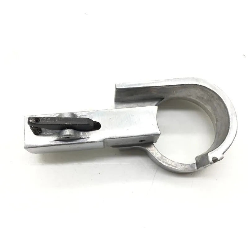 Metal pneumatic belt machine accessory kit with 330mm and 520mm rollers, blades, springs, and couplings on a workbench.
