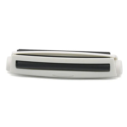 Manual plastic cigarette maker in six colours showing 110mm length for rolling shredded tobacco