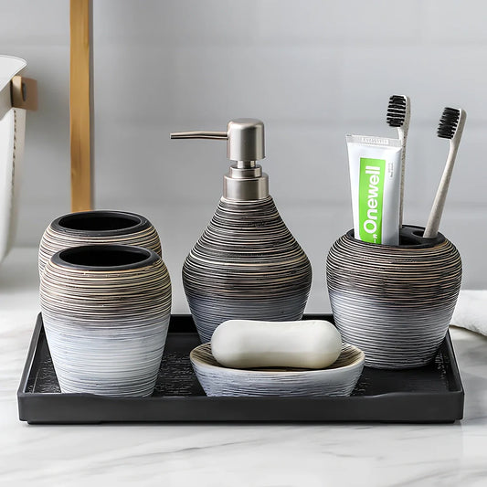 Retro brushed ceramic bathroom set with soap dish, toothbrush holder, and tumbler on vanity
