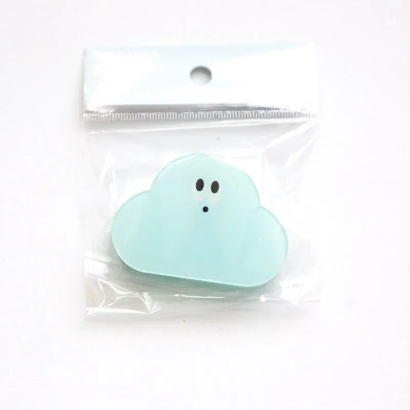 Colourful acrylic clip with cartoon design for holding photos and paper on pinboards.