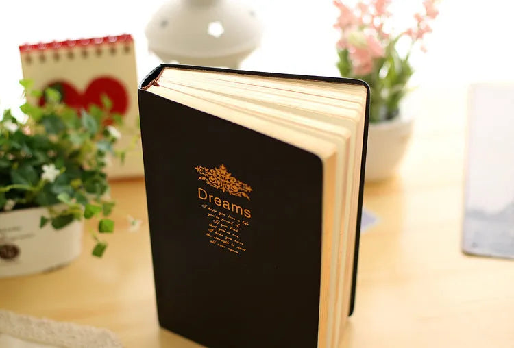 Jingu 25k thick imitation leather notebook open showing large 213x142mm pages