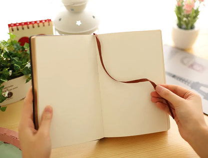 Jingu 25k thick imitation leather notebook open showing large 213x142mm pages