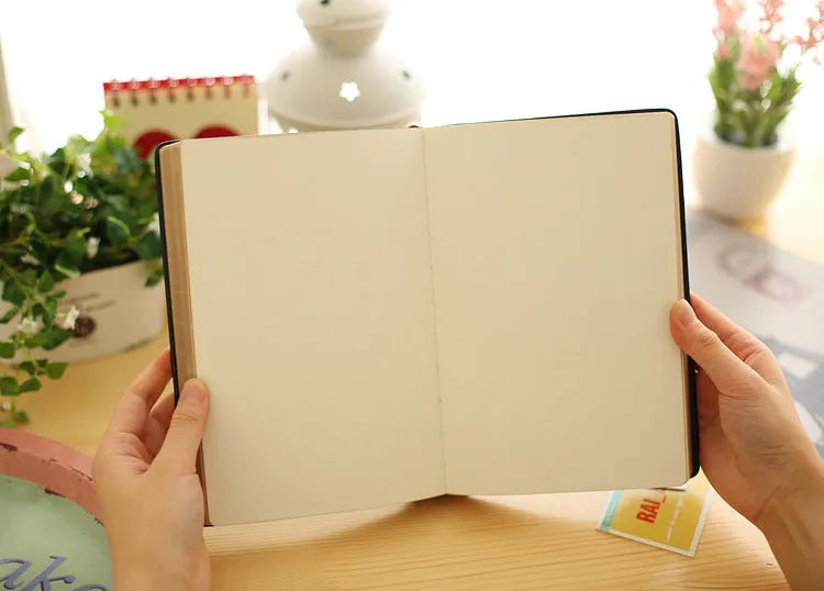 Jingu 25k thick imitation leather notebook open showing large 213x142mm pages