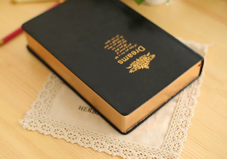 Jingu 25k thick imitation leather notebook open showing large 213x142mm pages