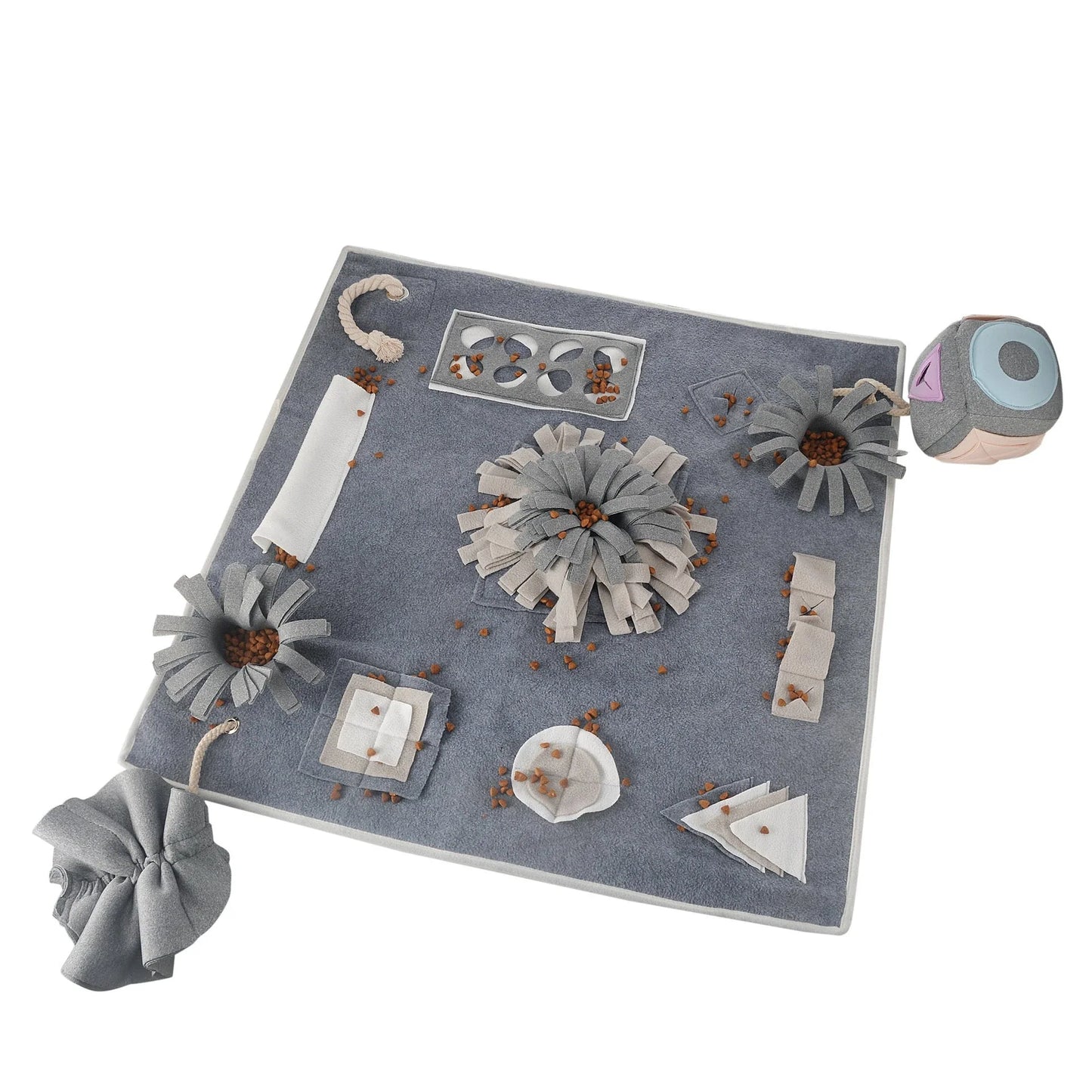 A grey snuffle pad with a soft, plush surface for hiding treats to stimulate a pet's natural foraging skills.