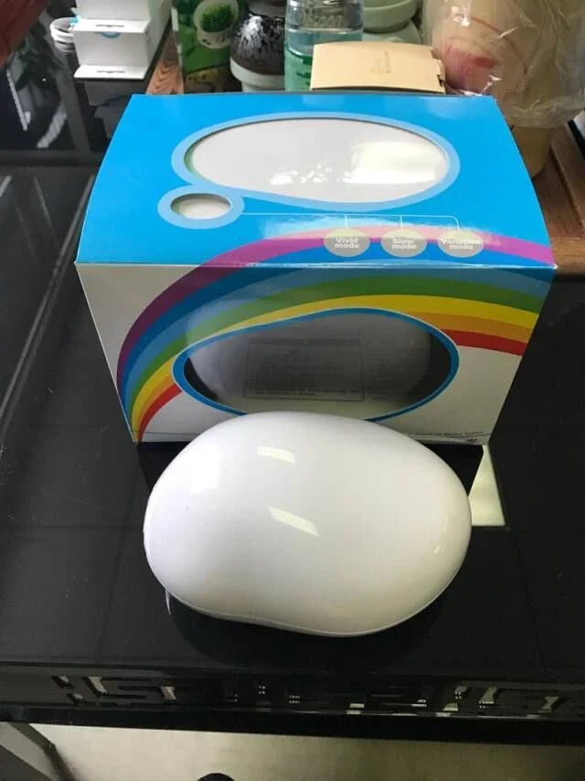 Enchanting Rainbow Projection Lamp with vibrant LED lighting and calming rainbow projection
