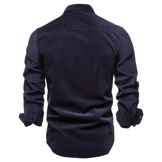 Men's long-sleeve linen shirt in Denim Blue colour, showing button front and sleeve detail
