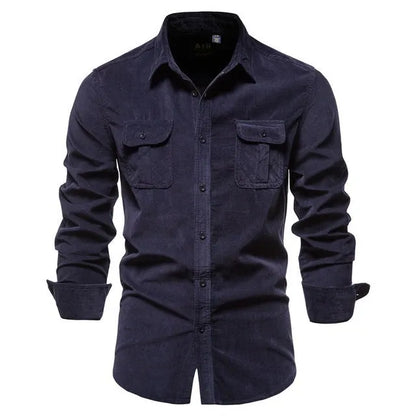 Men's long-sleeve linen shirt in Denim Blue colour, showing button front and sleeve detail