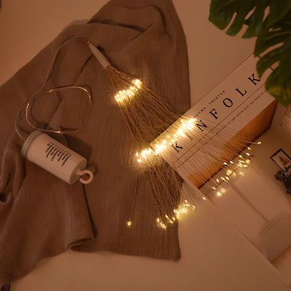 Solar LED meteor shower light with multiple warm white LEDs in outdoor garden setting