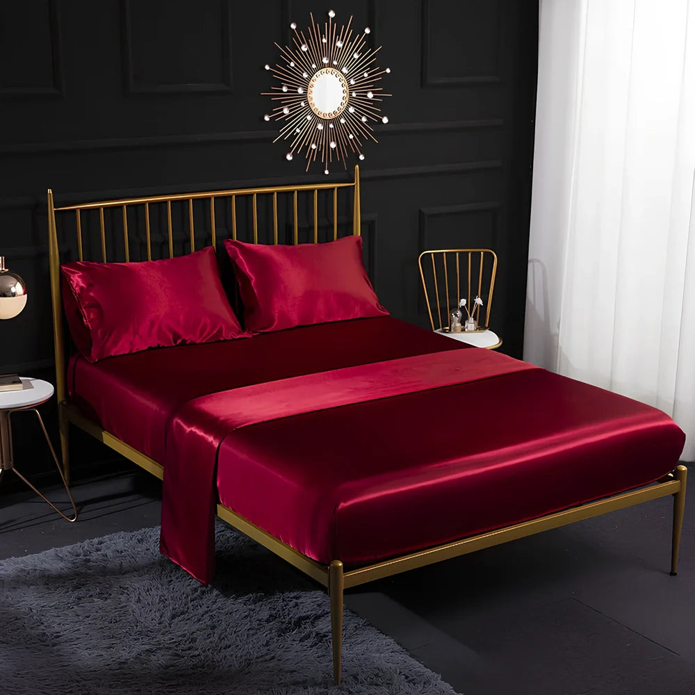 Ice silk bed sheet set in royal blue showing satin weave texture and reinforced corner stitching