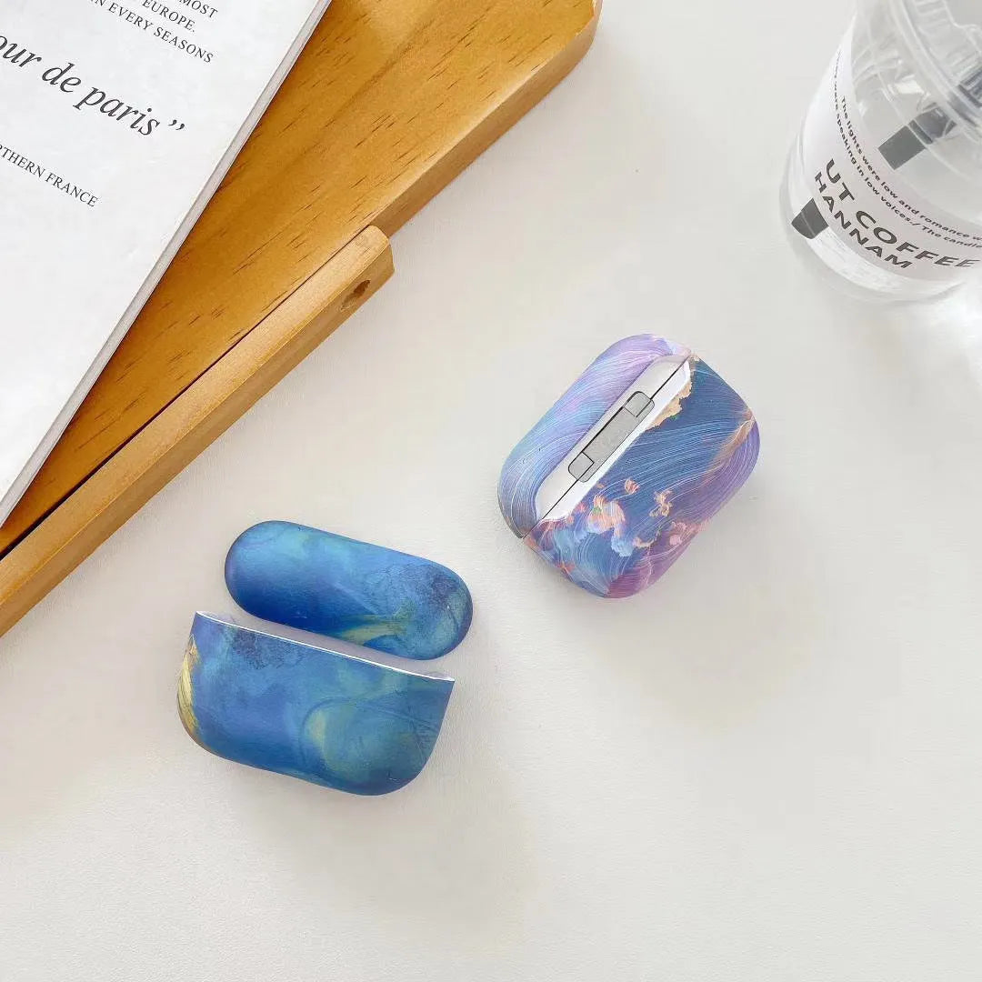 AirPods protective sleeve with watercolour design in pink and blue options for AirPods 1, 2 and Pro models