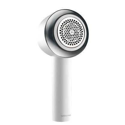 White rechargeable electric clothes shaver for removing fabric bobbles and lint.