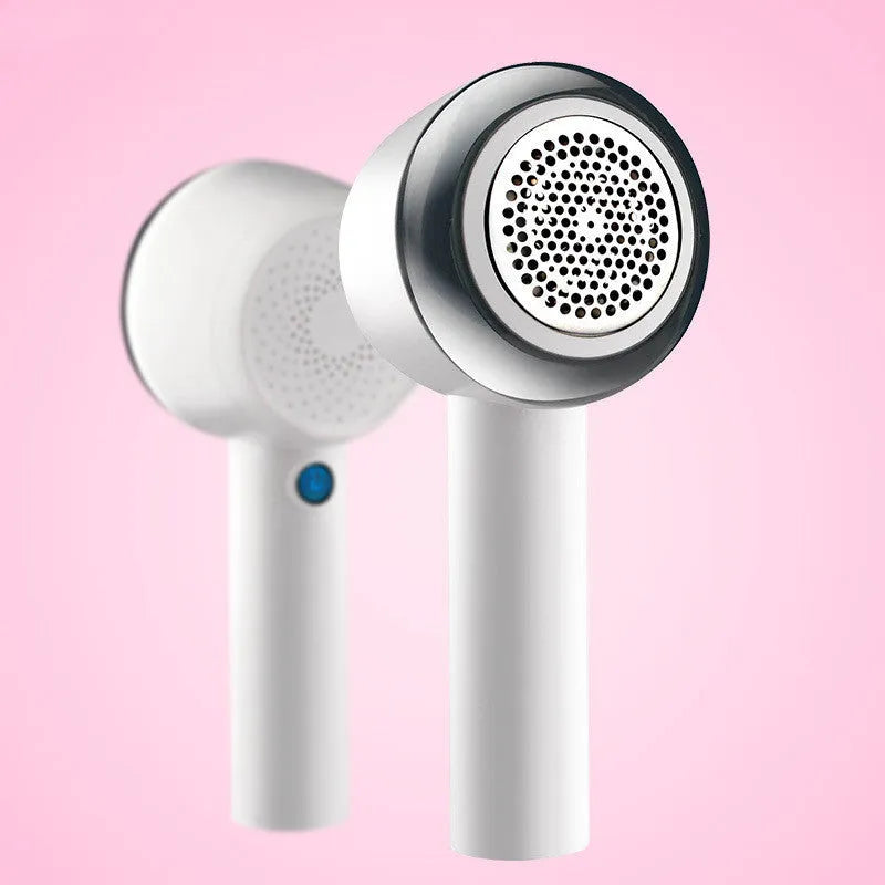 White rechargeable electric clothes shaver for removing fabric bobbles and lint.