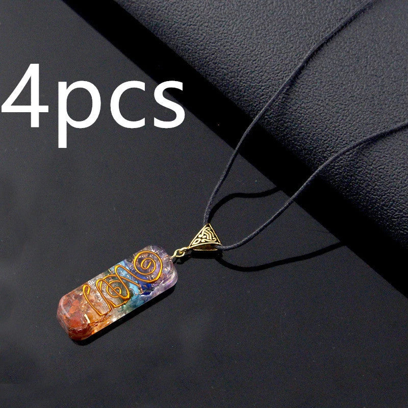 A stylish 7-chakra crystal pendant featuring a unique geometric design and natural stone patterns
