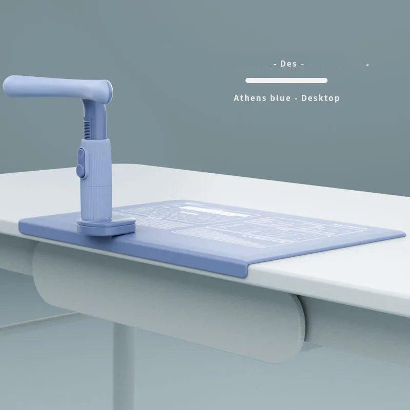 Children's ABS desk-mounted sitting posture corrector in blue, pink, or white for study desks.