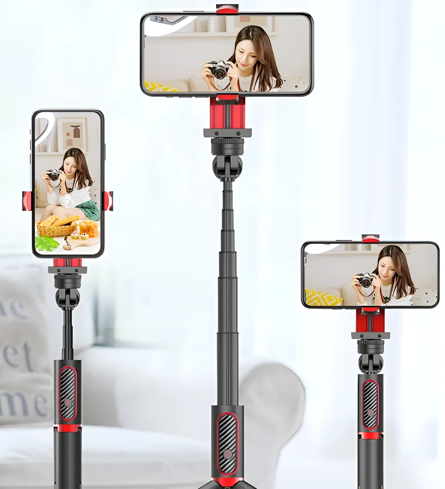 Black aluminium tripod extended to full height with a mobile phone clamped, showing the video stabiliser mechanism.
