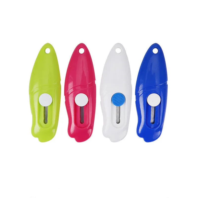 Cartoon art knife for manual production with plastic and metal construction in character design