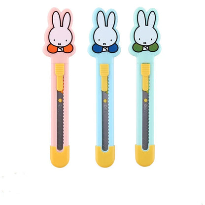 Cartoon art knife for manual production with plastic and metal construction in character design