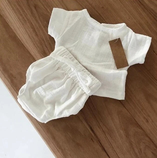 Baby boy summer clothes set with shirt and shorts for infants and toddlers aged 3 months to 14 years, featuring multiple style options and a size range from 6M to 4T to accommodate growth spurts