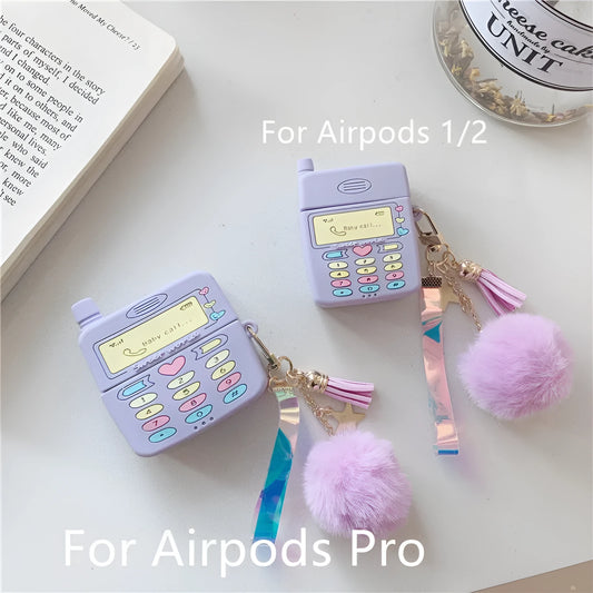 Purple silicone protective case for Apple AirPods with a white fur ball pendant attached.