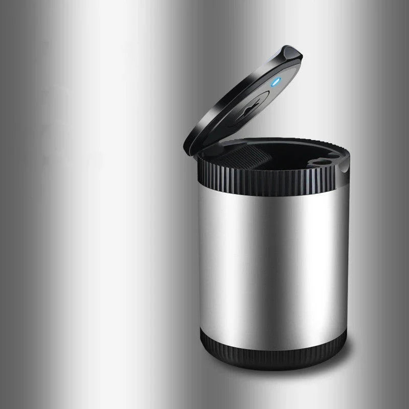 Sleek car ashtray with lid that seals in odors and safely contains cigarette butts without leaving marks