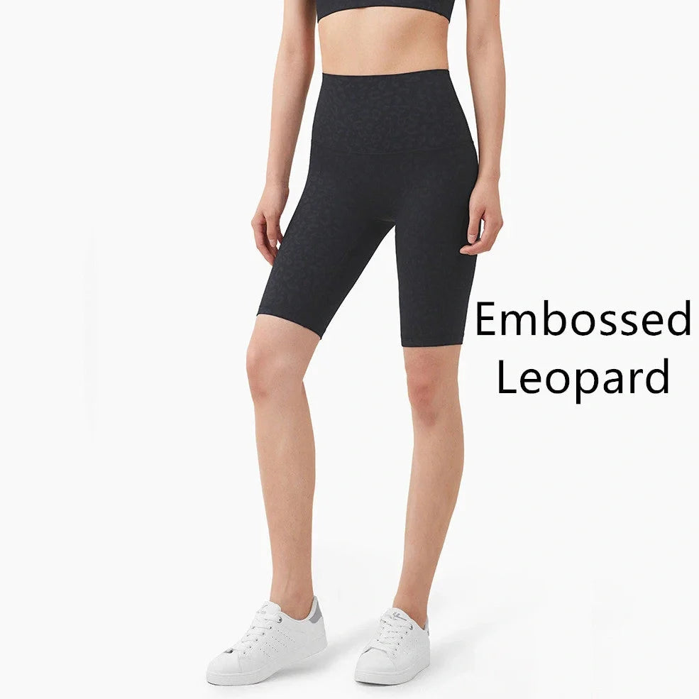 Women's yoga pants with five-point design in tidewater teal colour showing moisture-wicking nylon fabric