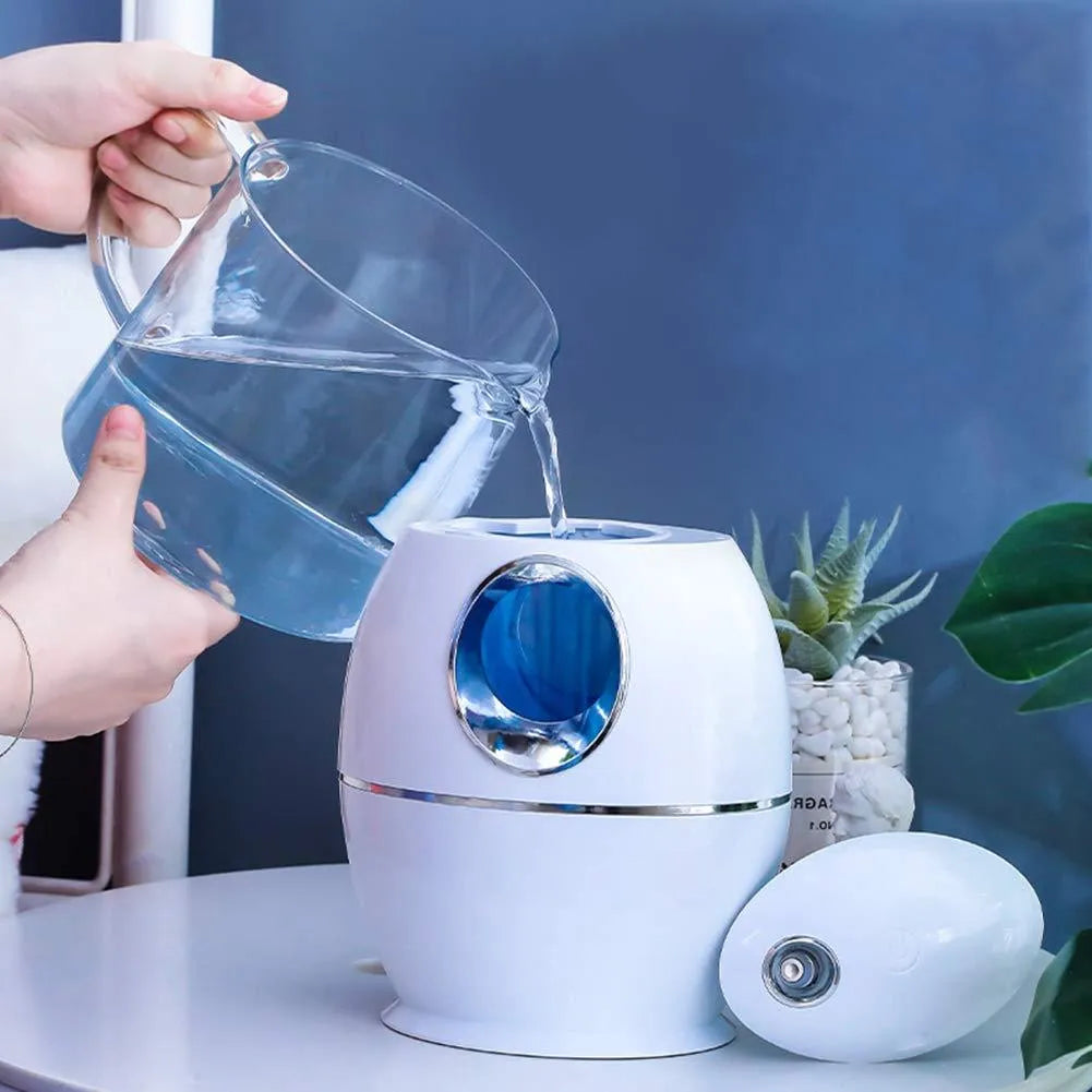 Round white USB aromatherapy humidifier with 800ml tank capacity and 36dB quiet operation