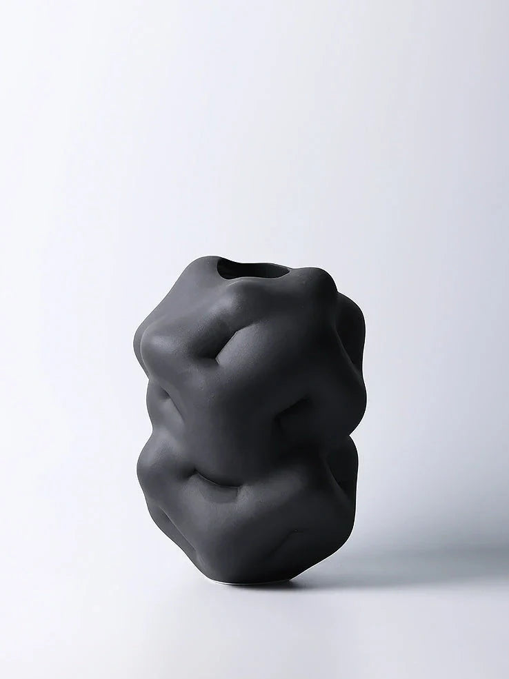 Ceramic flower vase with irregular textured surface, white or black finish, 34cm height