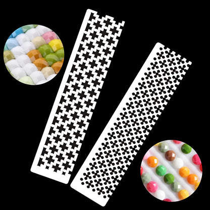 Stainless steel diamond painting grid ruler for round and square drills on a craft table.