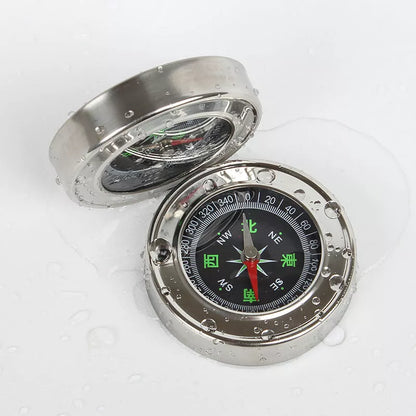 Stainless steel outdoor compass with brushed metal finish for hiking and camping