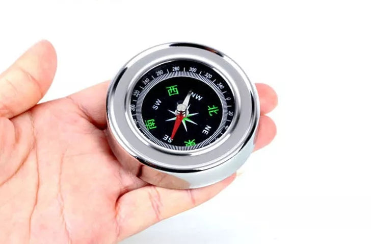 Stainless steel outdoor compass with brushed metal finish for hiking and camping