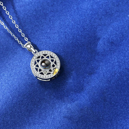 Personalized Sun and Moon Projection Necklace showcasing 100 languages I love you engraving