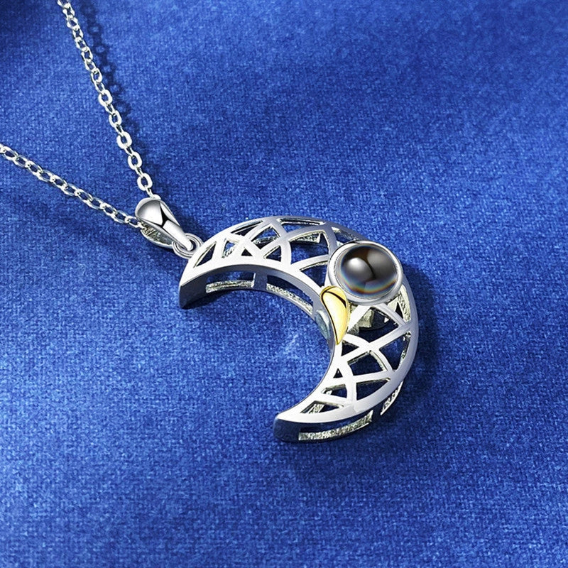 Personalized Sun and Moon Projection Necklace showcasing 100 languages I love you engraving