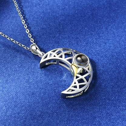 Personalized Sun and Moon Projection Necklace showcasing 100 languages I love you engraving