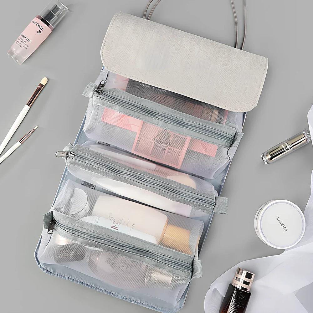 Grey foldable make-up bag with 4 mesh compartments showing 53cm expanded length