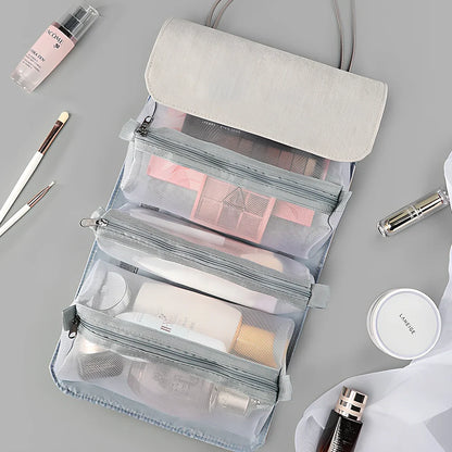Grey foldable make-up bag with 4 mesh compartments showing 53cm expanded length