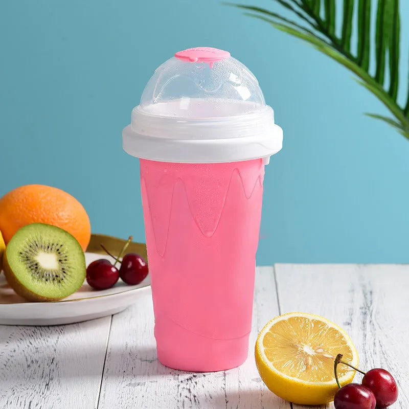 Silicone quick-freeze slush maker cup in mint green with lid and straw spoon