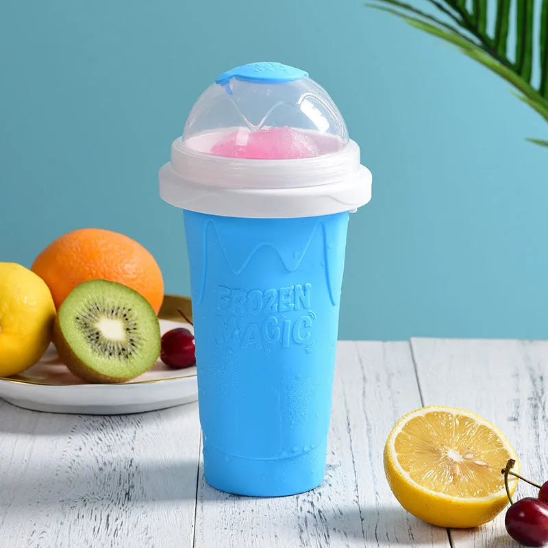 Silicone quick-freeze slush maker cup in mint green with lid and straw spoon